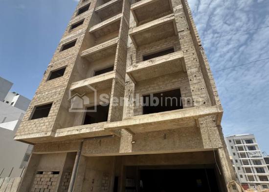 IMMEUBLE R+6 À VENDRE EN L'ÉTAT – OPPORTUNITÉ INVESTISSEUR À SOCABEG Ngor Almadie